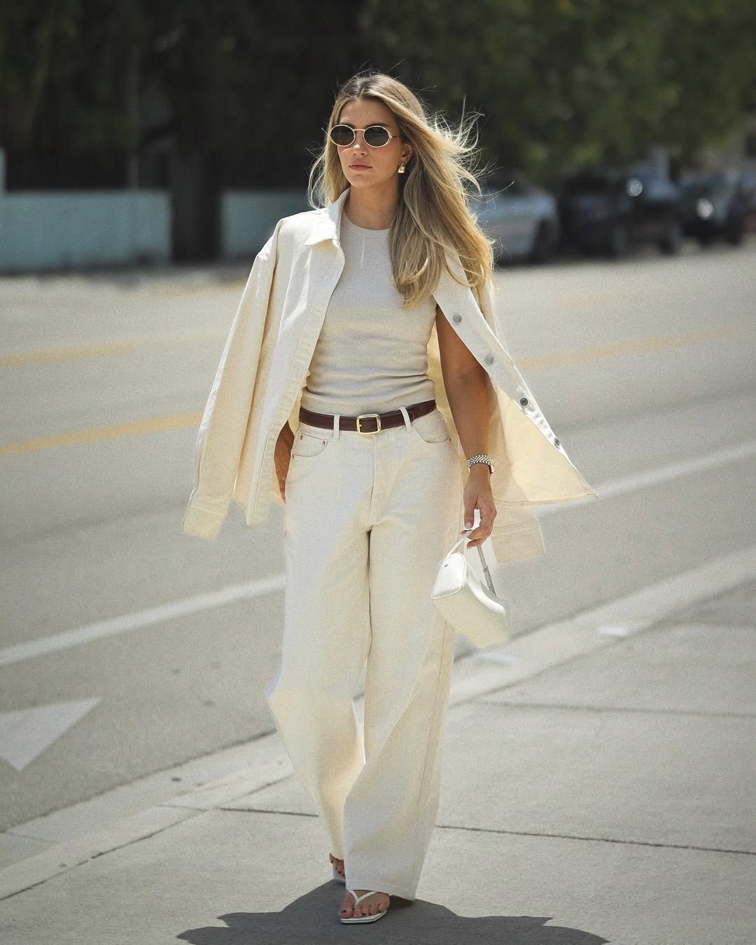 Cass Dimicco wearing heeled thong sandals