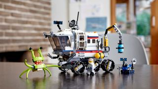 Lego space set with an alien and a moon rover