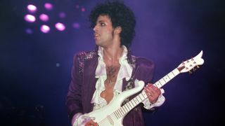 American singer, songwriter, musician, record producer, dancer, actor, and filmmaker Prince (1958-2016) performs onstage during the 1984 Purple Rain Tour on November 4, 1984, at the Joe Louis Arena in Detroit, Michigan