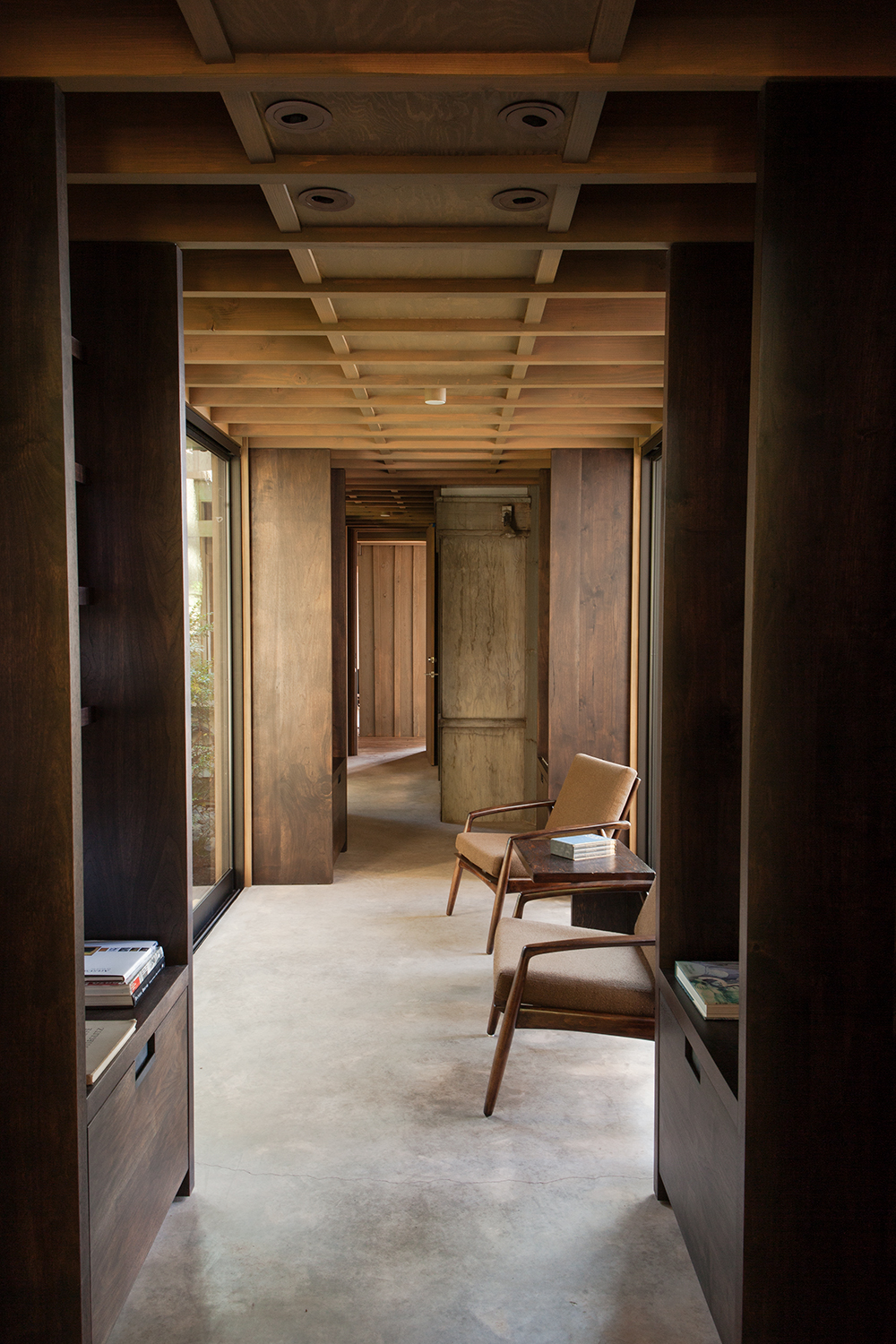 The hallway library at Jim Olson's holiday home in Washington state