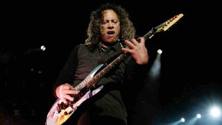 Metallica’s Kirk Hammett performing onstage in 2009