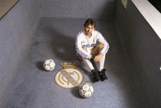 Rafael Martin Vazquez, football player Dress with the suit of the Real Madrid inside an empty pool.