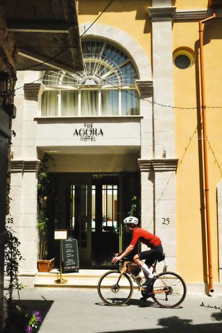 David Bradford rides past the front of the hotel