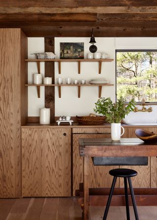 A kitchen with matching countertops and cabinets