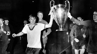 1968 European Cup Final at Wembley. Manchester United 4 v Benfica 1. United's George Best holds the trophy on a lap of honour after the match. 29th May 1968. (Photo by Staff/Daily Mirror/Mirrorpix via Getty Images)