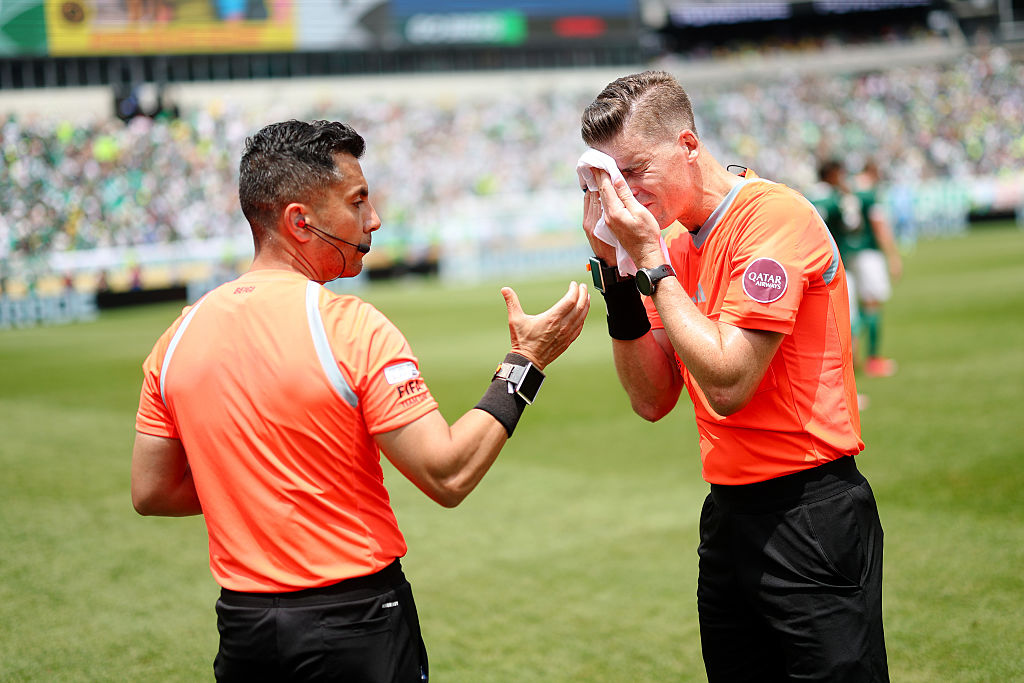 Referee Francois Letexier cools down during a hydration break during the FIFA Club World Cup 2025