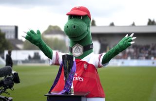 Jerry Quy has played the part of Arsenal mascot Gunnersaurus for 27 years.