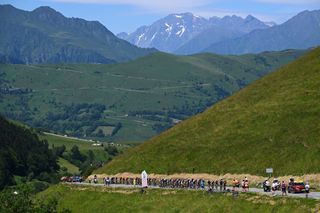 PLATEAU DE BEILLE FRANCE JULY 14 A general view of the peloton competing at the Col de Peyresourde 1569m during the 111th Tour de France 2024 Stage 15 a 1977km stage from Loudenvielle to Plateau de Beille 1782m UCIWT on July 14 2024 in Plateau de Beille France Photo by Tim de WaeleGetty Images