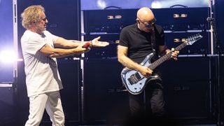 Sammy Hagar (L) and guitarist Joe Satriani perform at PNC Music Pavilion on July 19, 2024 in Charlotte, North Carolina.