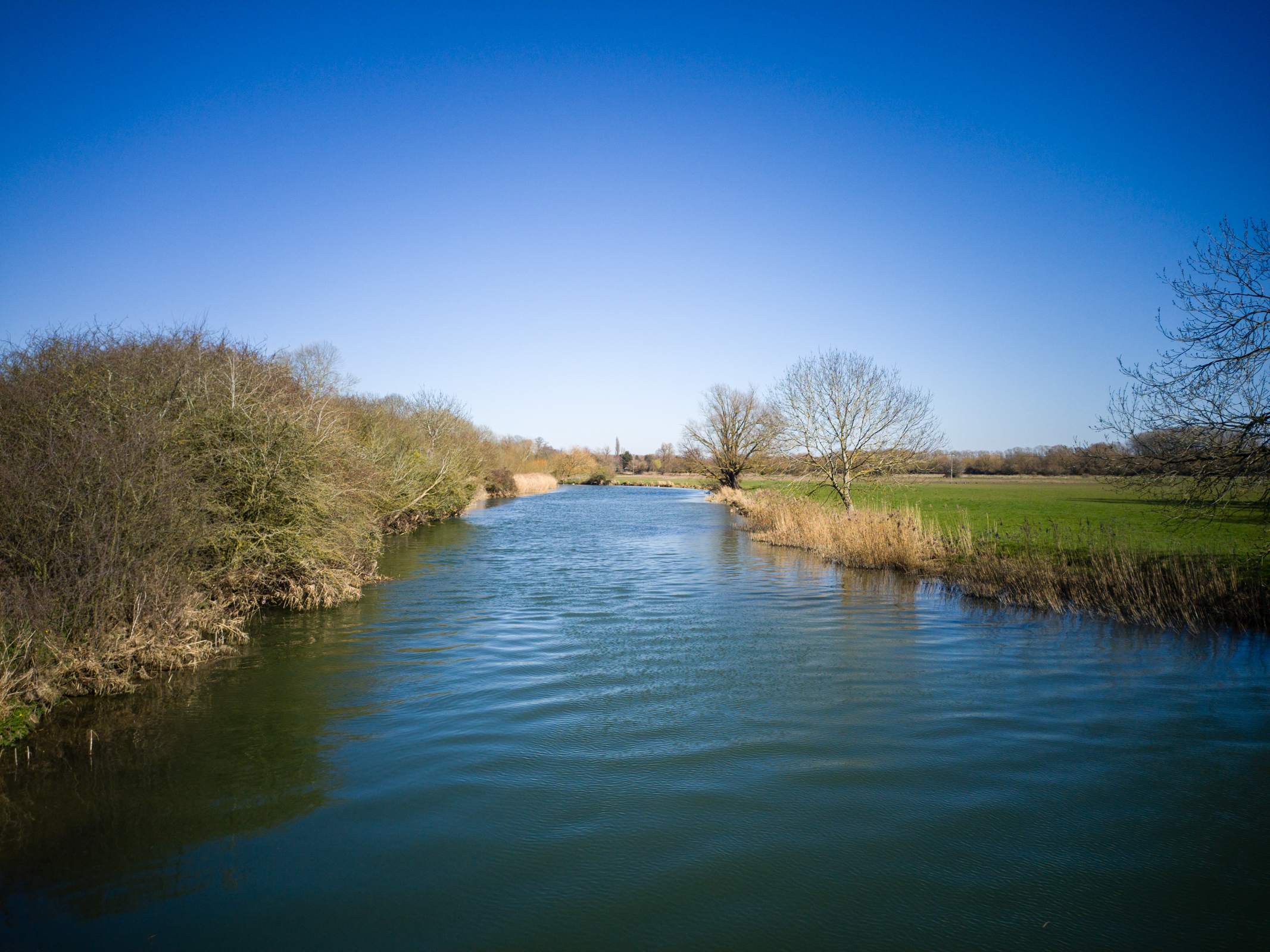 Photo of a river on a bright sunny day taken with the Potensic Atom 2 drone