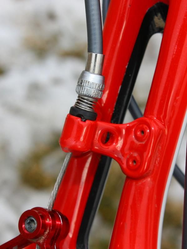 The rear brake adjuster is borrowed from an old Shimano derailleur.