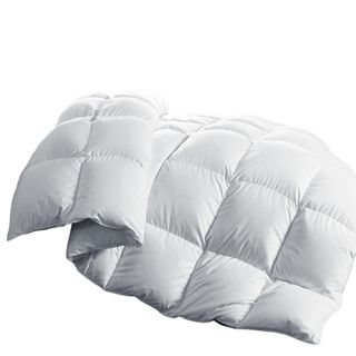 A white plush, padded comforter