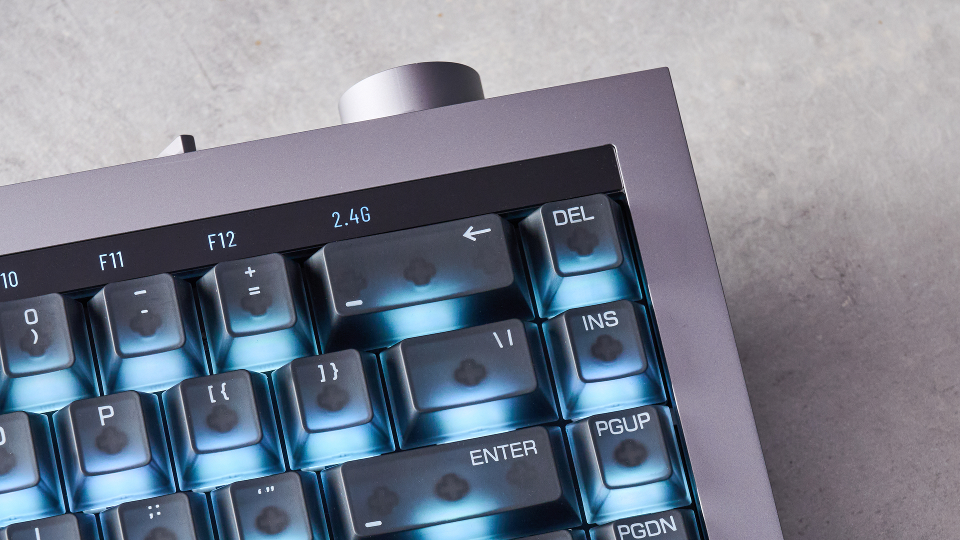 The Lofree Hyzen keyboard on a stone surface