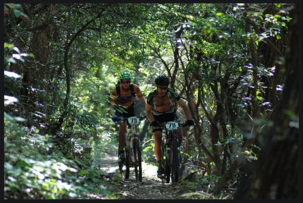Two racers in the Pisgah Mountain Bike Stage Race.