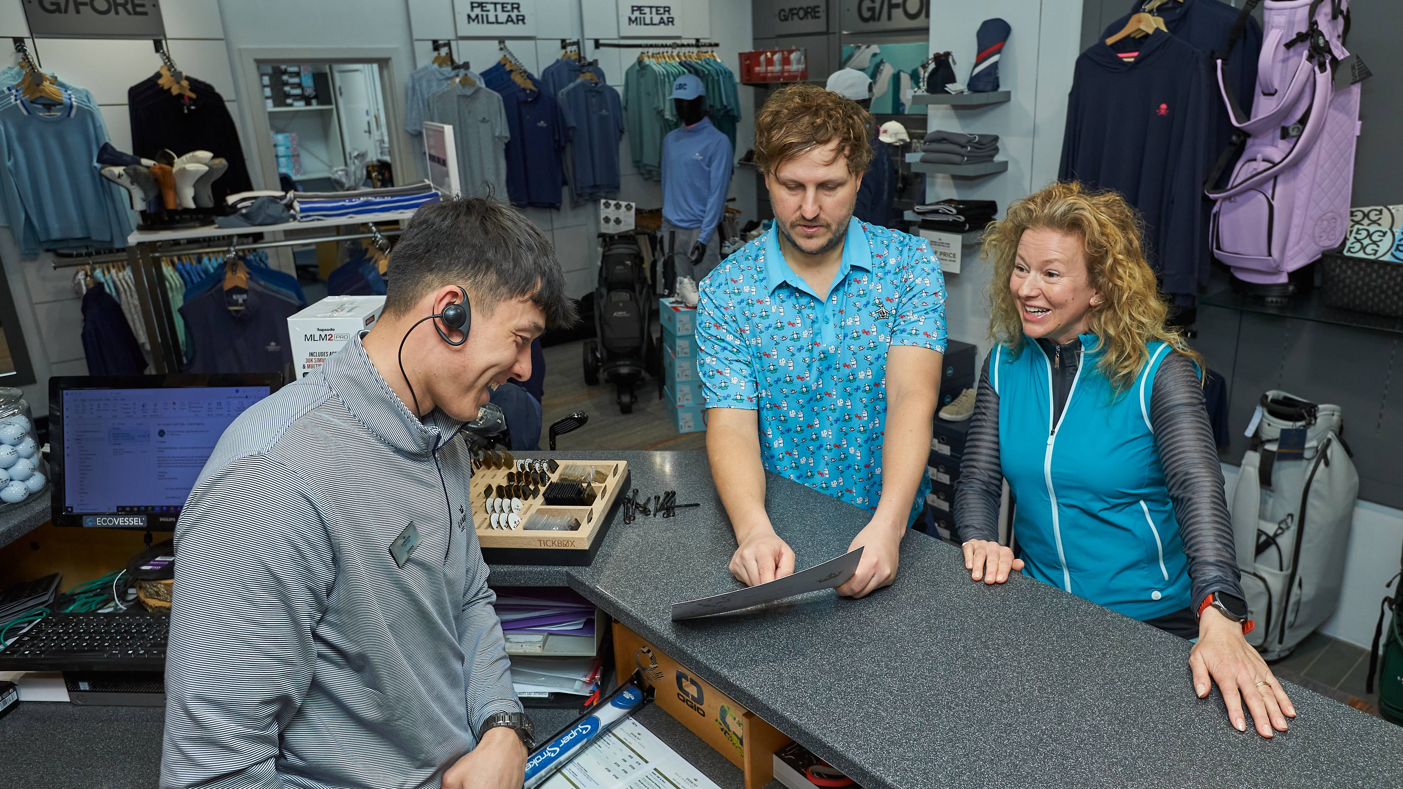 Nick Bonfield and Katie Dawkins in a pro shop