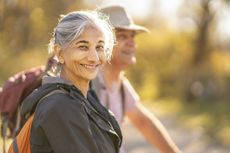 A couple on a hike on a sunny day