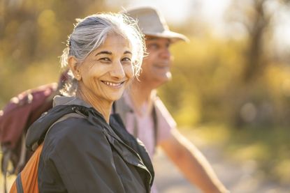 A couple on a hike on a sunny day