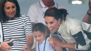 Carole Middleton, Princess Charlotte and Princess Catherine attend the presentation following the King's Cup Regatta