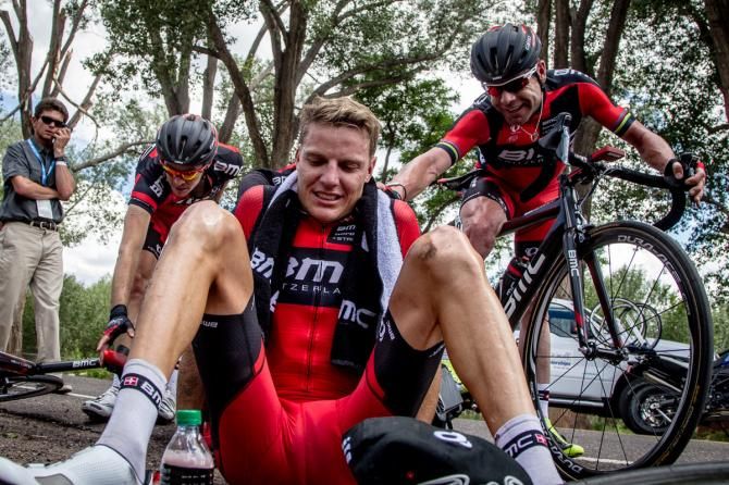 Michael Schar (BMC) gets congratulated by teammates after his win