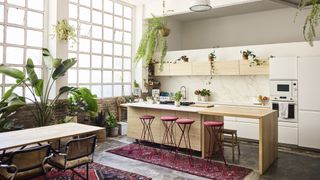 Kitchen island with burgundy bar stools