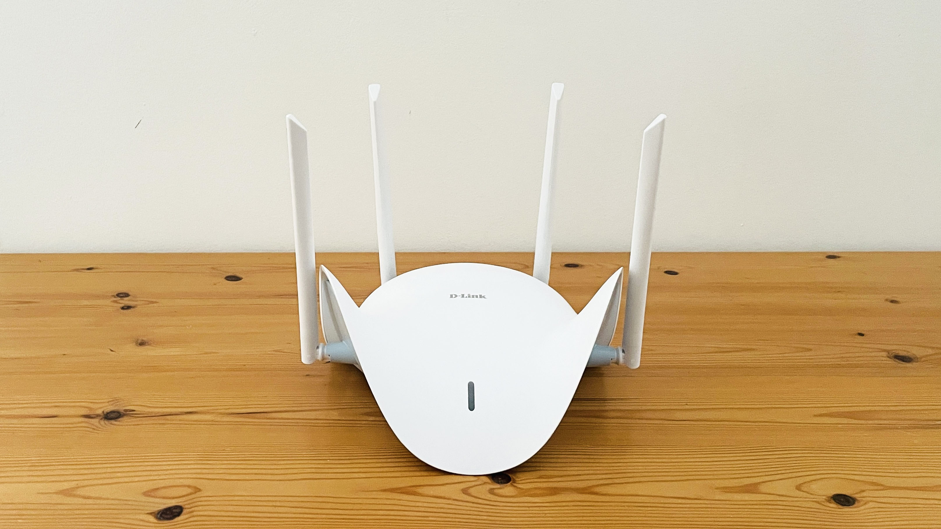 D-Link Aquila Pro AI R95 on wooden table