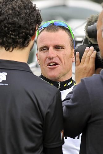 Current title holder Gordon McCauley conducts pre race interviews.