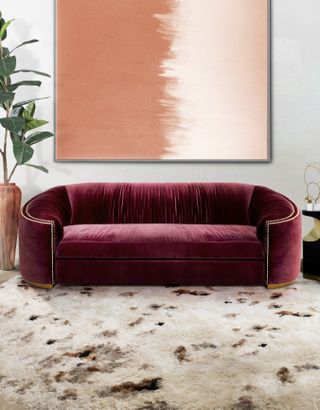 A magenta colored sofa