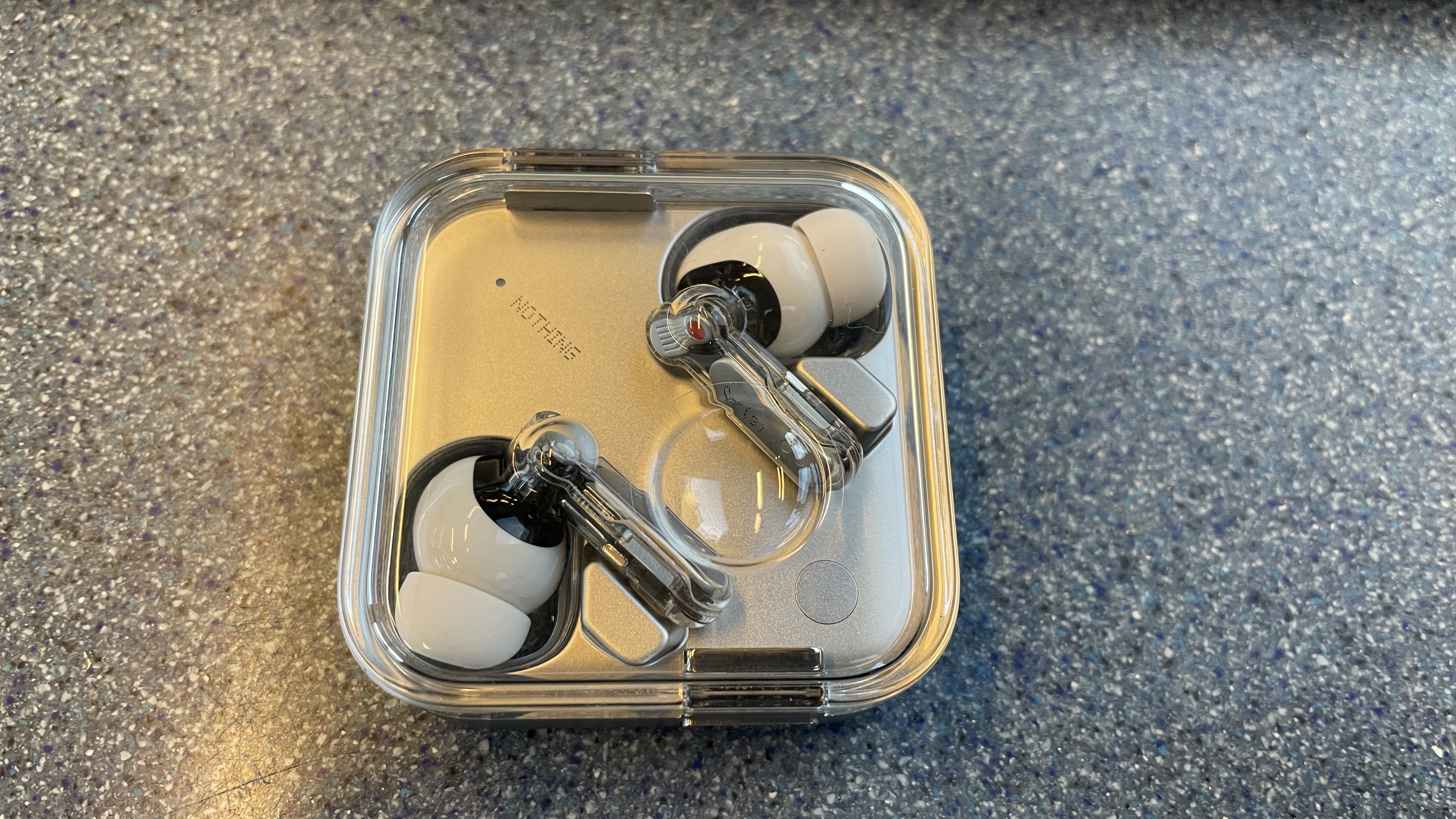 Nothing Ear (3) being tested on a commuter train late at night