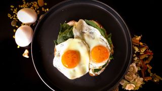 Eggs in a pan, a high-fat high-protein breakfast