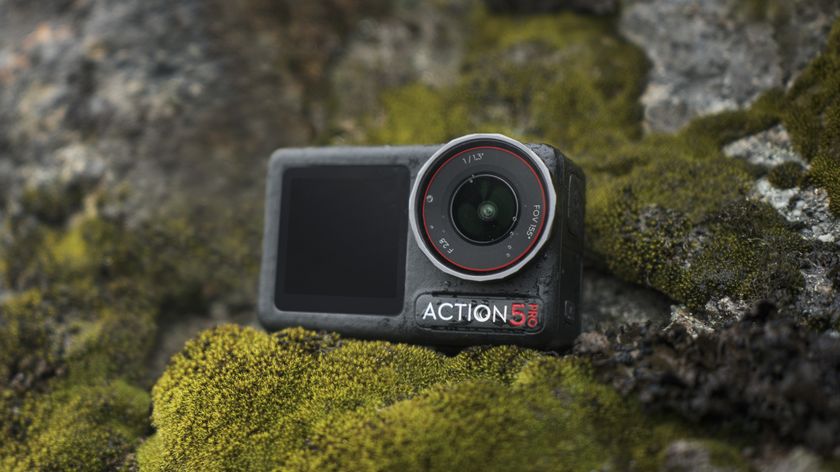 DJI Osmo Action 5 Pro camera on a mossy rock