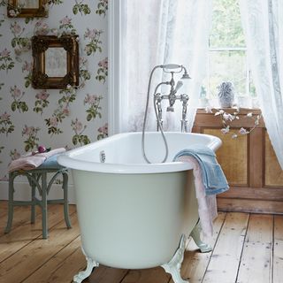 country bathroom with floral wallpaper