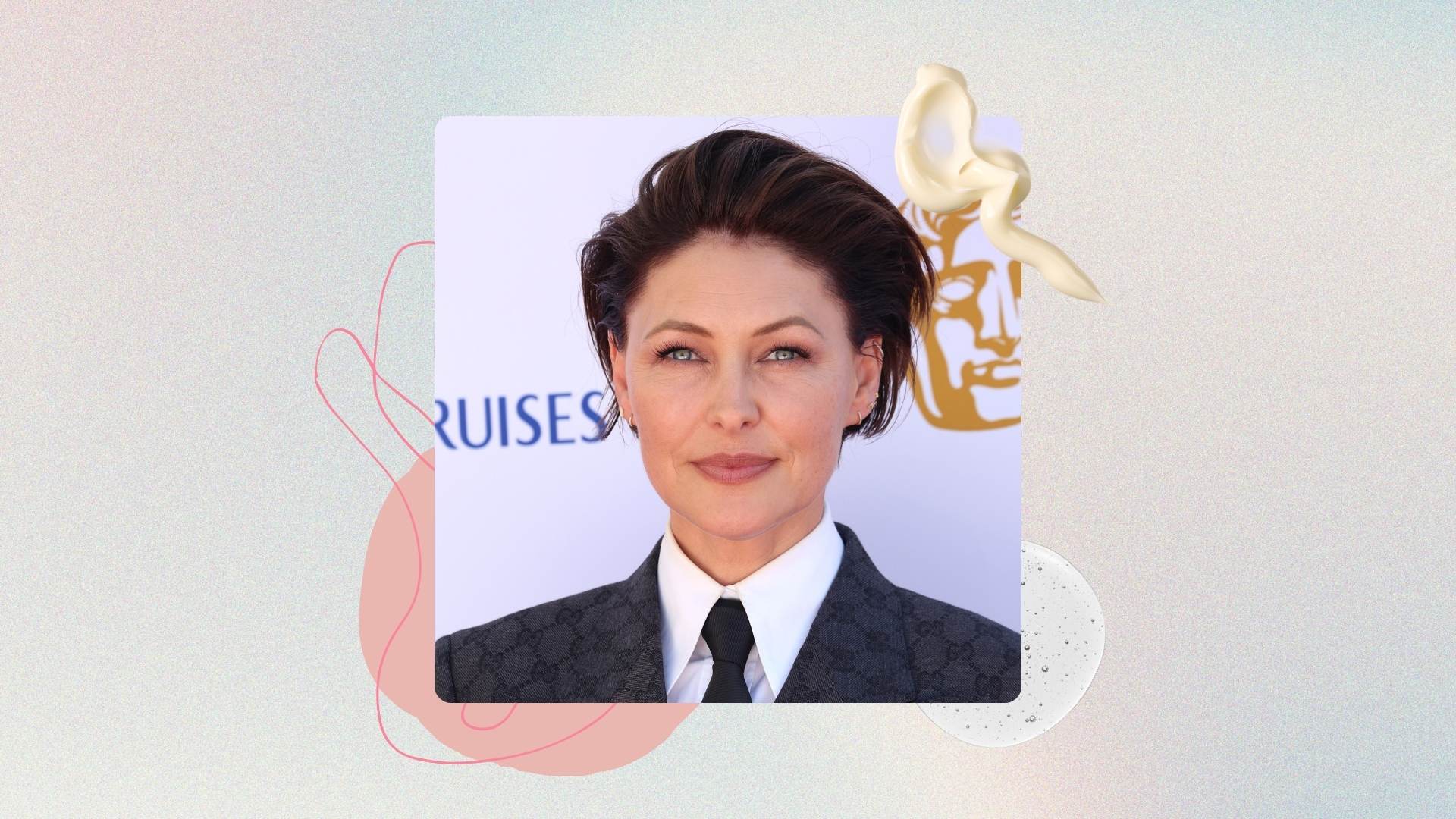 Emma Willis smiling with short brunette pixie with a side parting and wearing a black blazer, white shirt and black tie, on a pastel watercolour background with pink graphics and cream and serum swatches