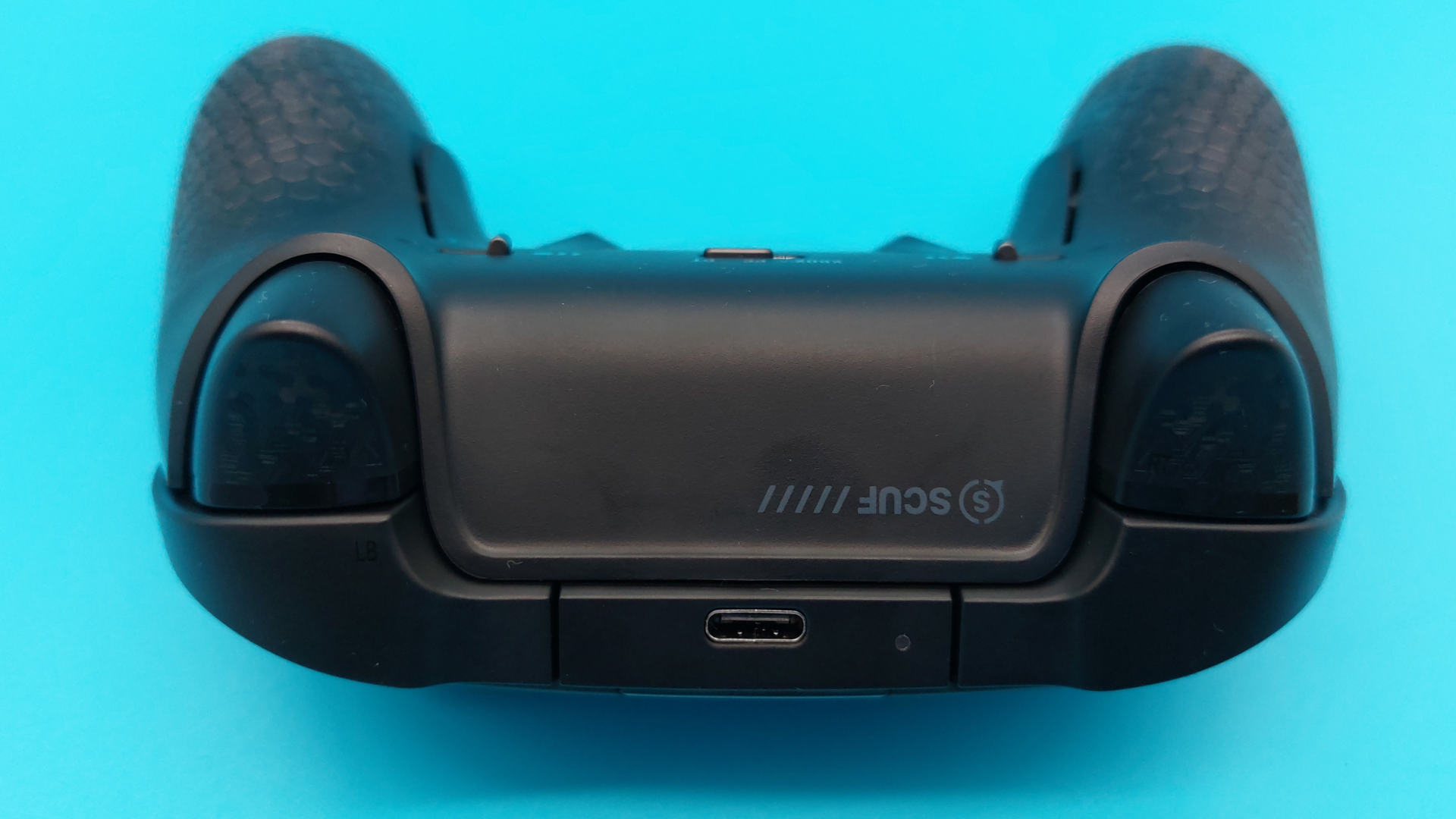 The Scuf Valor Pro wireless controller seen from various angles.