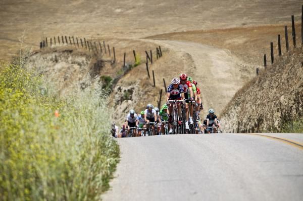 The group comes up one the many little rollers through today's farm country.