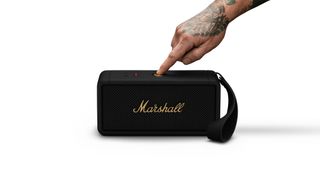 Marshall Middleton in black on a white background with a tattooed hand pushing the main button