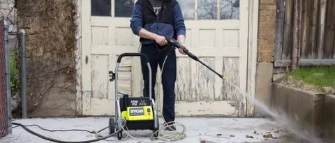 RYOBI RY14122 being used to clean concrete yard slabs