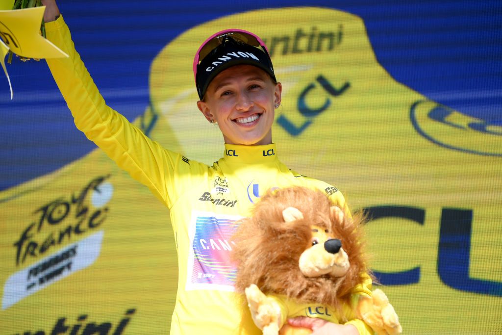 AMNEVILLE FRANCE AUGUST 15 Katarzyna Niewiadoma of Poland and Team CanyonSRAM Racing celebrates at podium as Yellow Lader Jersey winner during the 3rd Tour de France Femmes 2024 Stage 5 a 1522km stage from Bastogne to Amneville UCIWWT on August 15 2024 in Amneville France Photo by Alex BroadwayGetty Images