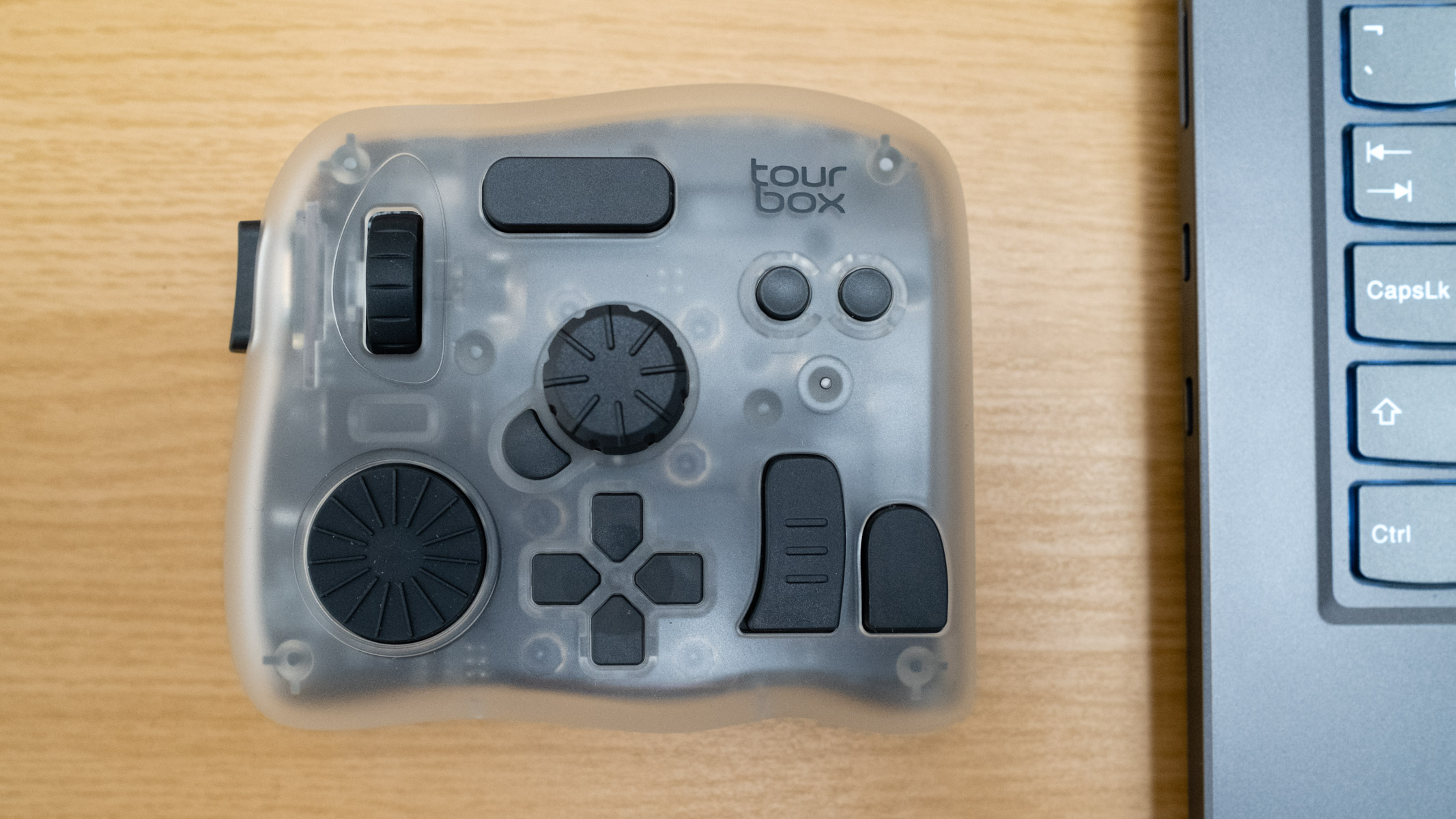 Tourbox Elite Plus next to a laptop