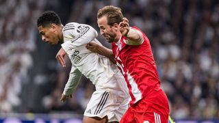 England teammates Jude Bellingham and Harry Kane battling for the ball during a Bayern Munich vs Real Madrid game
