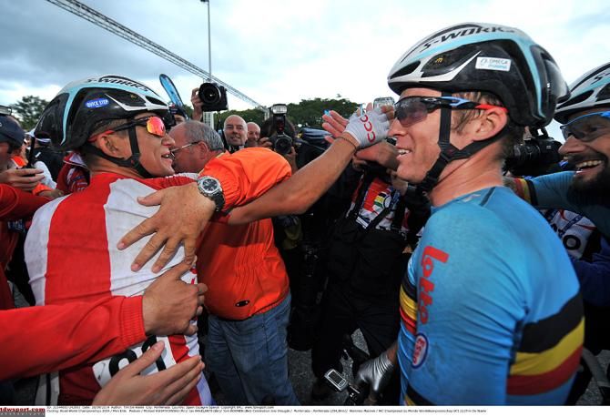 Michal Kwiatkowski (Poland) is congratulated for his Worlds road race victory