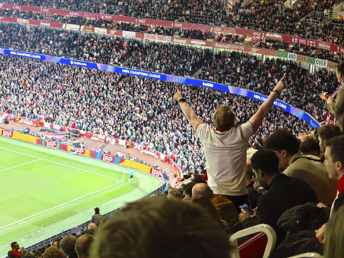 Action photos during a Champions League soccer match at Arsenal's Emirates stadium, taken with the Oppo Find X9 Ultra and teleconverter lens