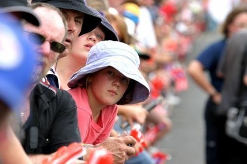 The large crowd in Tanunda waits anxiously for the riders