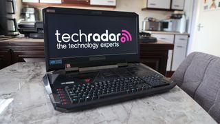 Acer Predator 21X gaming laptop on a marble table top