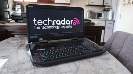 Acer Predator 21X gaming laptop on a marble table top