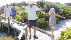 Grandparents on a nature walk with their grandchildren. 