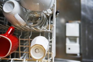 Clean mugs and glasses in dishwasher