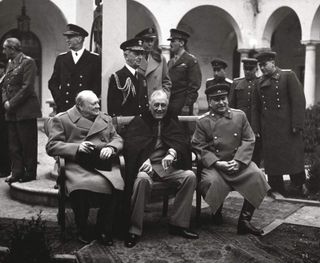 Conference of the 'Big Three' at Yalta — making final plans for the defeat of Germany. Pictured are Prime Minister Winston S. Churchill, President Franklin D. Roosevelt, and Premier Josef Stalin. February 1945.