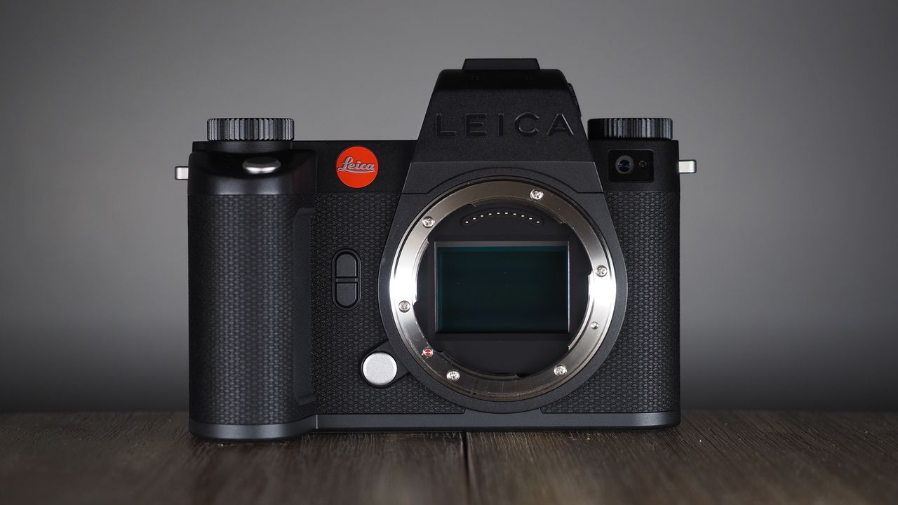 Leica SL3-S on a wooden surface with moody lighting