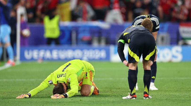 Scotland players dejected after defeat to Hungary and elimination from Euro 2024.