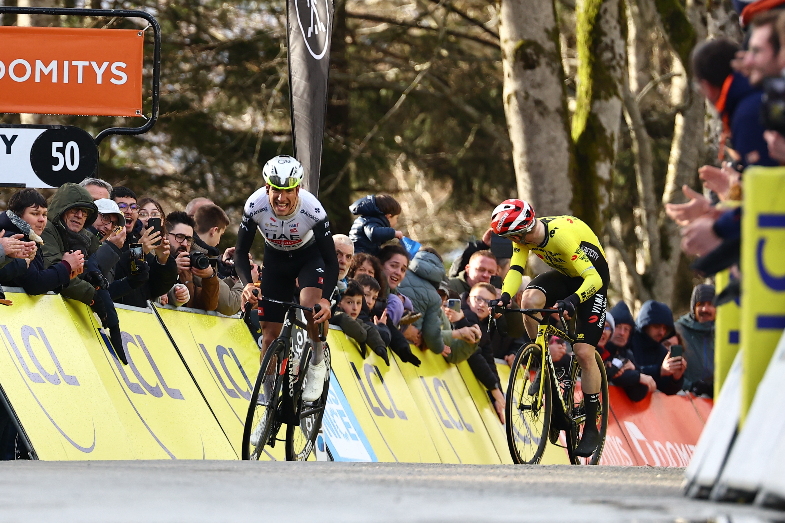 Portuguese Joao Almeida of UAE Team Emirates wins ahead of Danish Jonas Vingegaard Hansen of Team Visma-Lease a Bike in stage four of the 83th edition of the Paris-Nice cycling race, 163,4km from Vichy to La Loge des Gardes, France, Wednesday 12 March 2025. BELGA PHOTO DAVID PINTENS (Photo by DAVID PINTENS / BELGA MAG / Belga via AFP) (Photo by DAVID PINTENS/BELGA MAG/AFP via Getty Images)